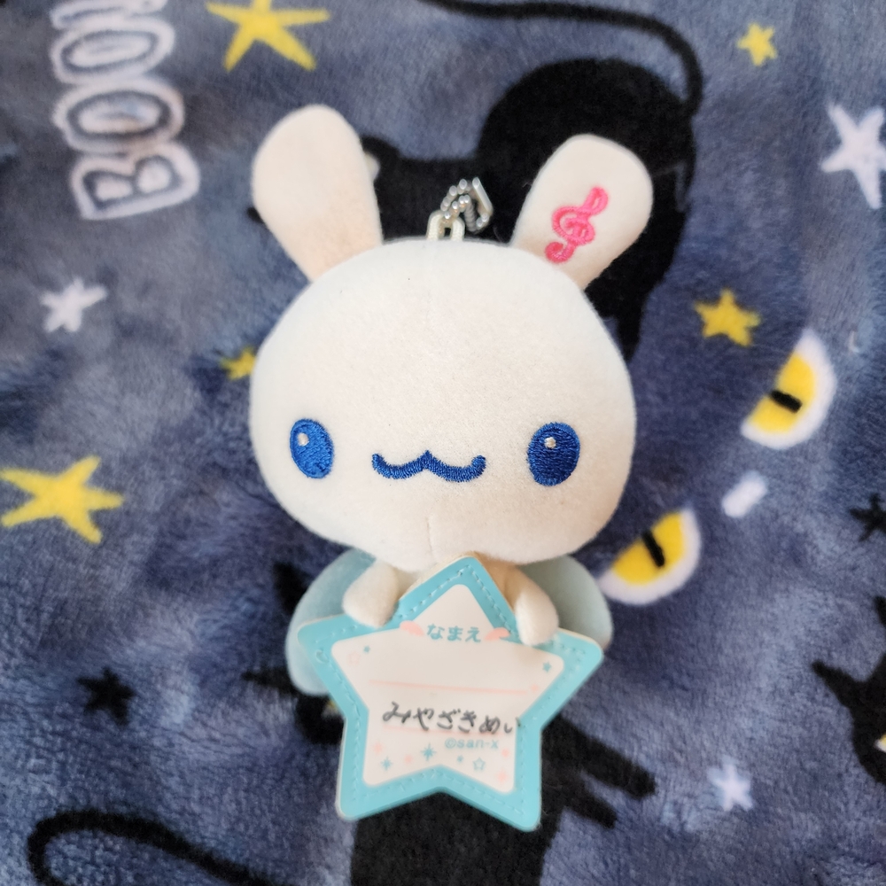 White and Blue Stuffed Animal Toy